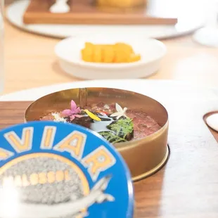 Kaluga caviar, bluefin tuna, sesame oil with Hokkaido uni add-on