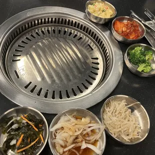 Grill you cook on in middle of table.