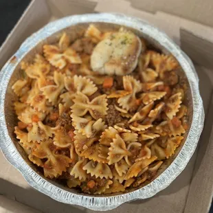 a bowl of pasta in a box