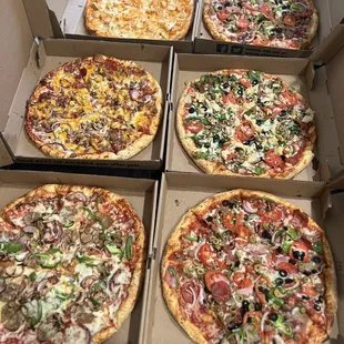 six pizzas in a box