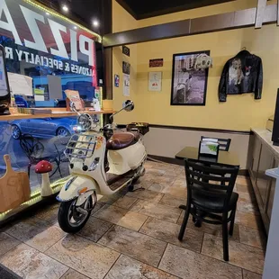 a scooter parked in a restaurant