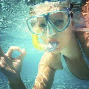 Snorkel Adventure in 80 degrees water with colorful reef fish &amp; stingrays