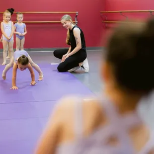 Acro students with teacher