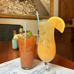 two cocktails on a table