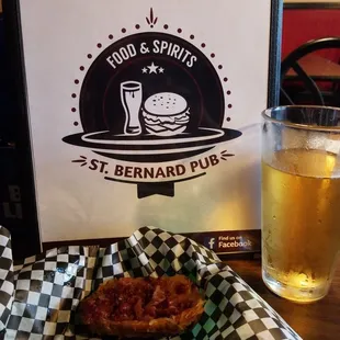 a burger and a glass of beer