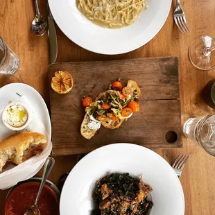 Cacio Pepe and squid ink pasta, bread with ricotta