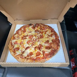 Pepperoni and Pineapple Pizza well done as ordered!