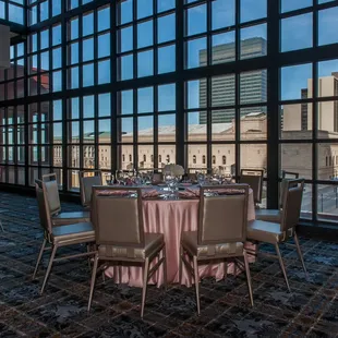 Panoramic floor-to-ceiling windows overlook the Cleveland citiscape