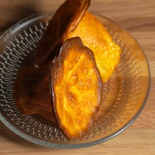 a plate of baked sweet potatoes