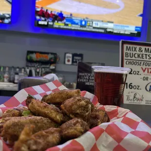 Jamaican jerk, chicken wings and a surly furious in the sports book. A decent place to watch sports.