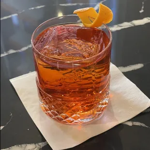 Misfit Negroni. Spirit forward. Has Montelobos mezcal, Carpano Antica, Campari