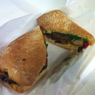 Special: eggplant &amp; portobello panini. (Crouching paper, hidden pickle.)