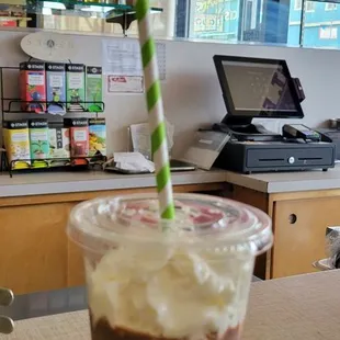 Half of a chocolate shake.