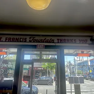 "Thank you" sign over the door as you leave.