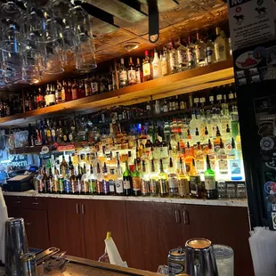 a bar filled with alcohol bottles