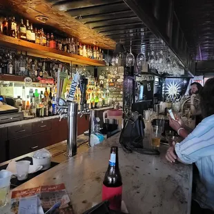 people sitting at the bar