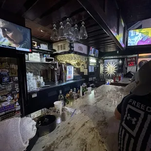 a man sitting at the bar
