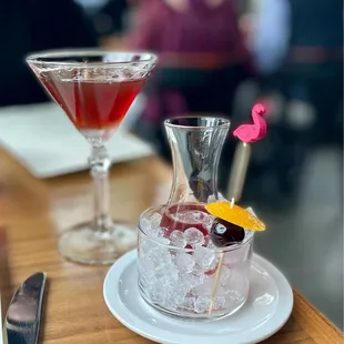 two cocktails on a table