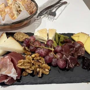 3 cheese, 2 meats charcuterie board. Shareable for 2-3 people.