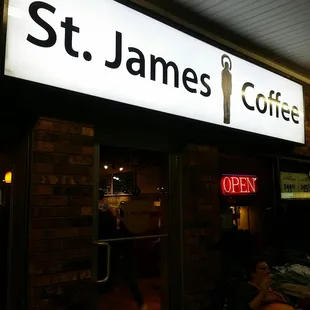 the entrance to a coffee shop