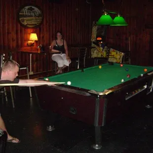 a man playing pool
