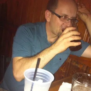 Woody enjoys a red rye!