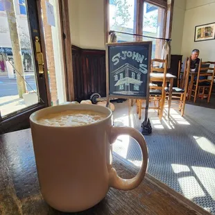 Coffee at table next to entrance