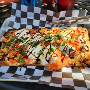 Yummy balsamic sauce on the Margarita Flat bread. Service was friendly and the outdoor patio area cozy. Would recommend the food.