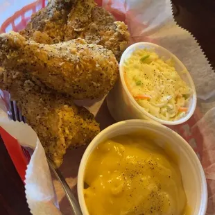 3 pieces of fried chicken, mashed potatoes and gravy, and cole slaw