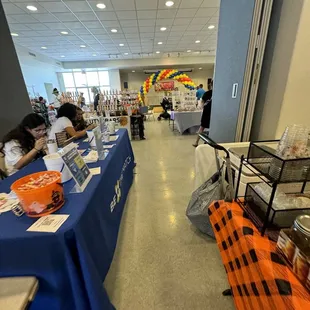 a long table with a blue tablecloth