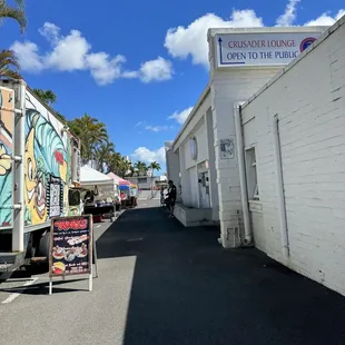 a truck parked in front of a building