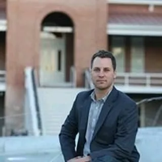 Alan K.