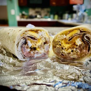 Eggs, cheese, potato, added beans, cheese, onion.