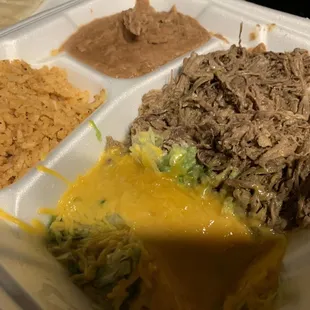 a meal in a styrofoam container