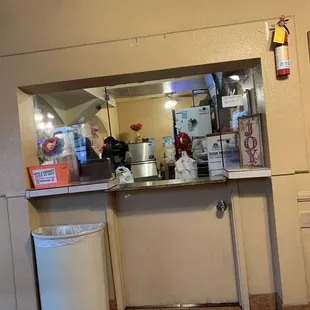 a woman behind the counter