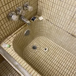 Bathtub is odd and  old