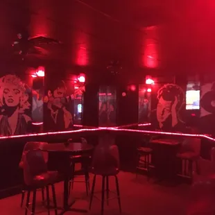 a bar with red lighting