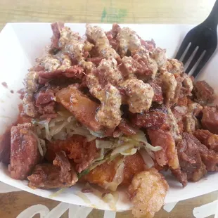 Paddy! White cheddar cake with cabbage slaw flavored with Irish whiskey, and smoked corned beef. $9 full order. Filling!