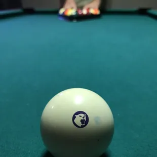 a billiard ball on a pool table