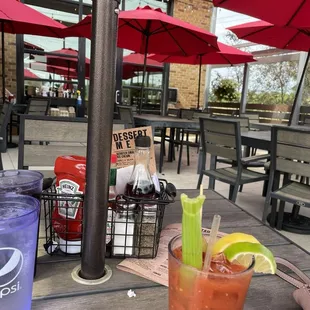 Picture of outdoor dinning area. More located along the front.  Bloody Mary drink. Spicy!
