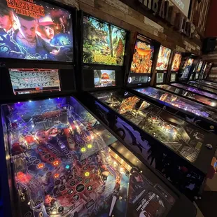a row of pinball machines