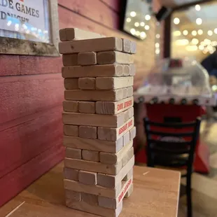 a stack of wooden blocks on a table