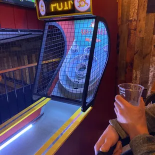 a pinball game being played