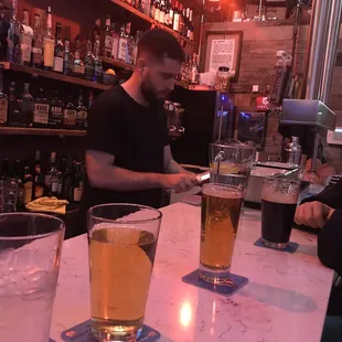 Beers lined up at the bar