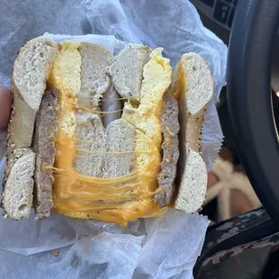Egg cheese and sausage with cheddar cheese on everything bagel