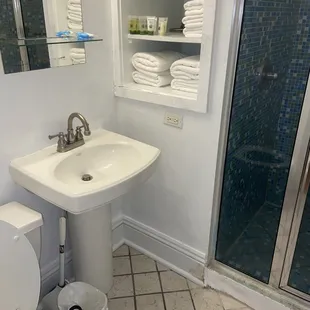 You can see the grime on the floor around the shower and in the sink and toilet.