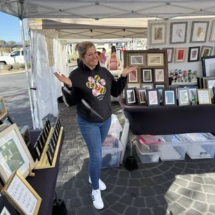 Local artist with botanical art, dried cactus over paper and or images