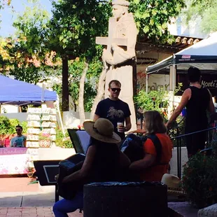 Music by St Philip's statue