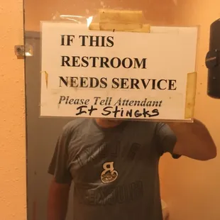a man holding a sign