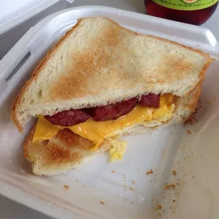 Smoke sausage breakfast sandwich